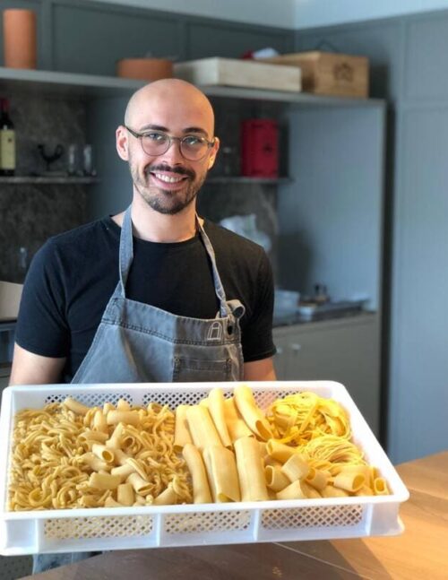 "Chef Alessandro Iovine cooking pasta"