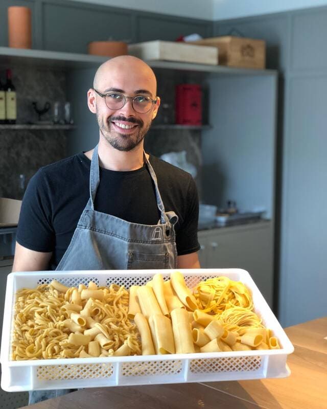 "Chef Alessandro Iovine cooking pasta"